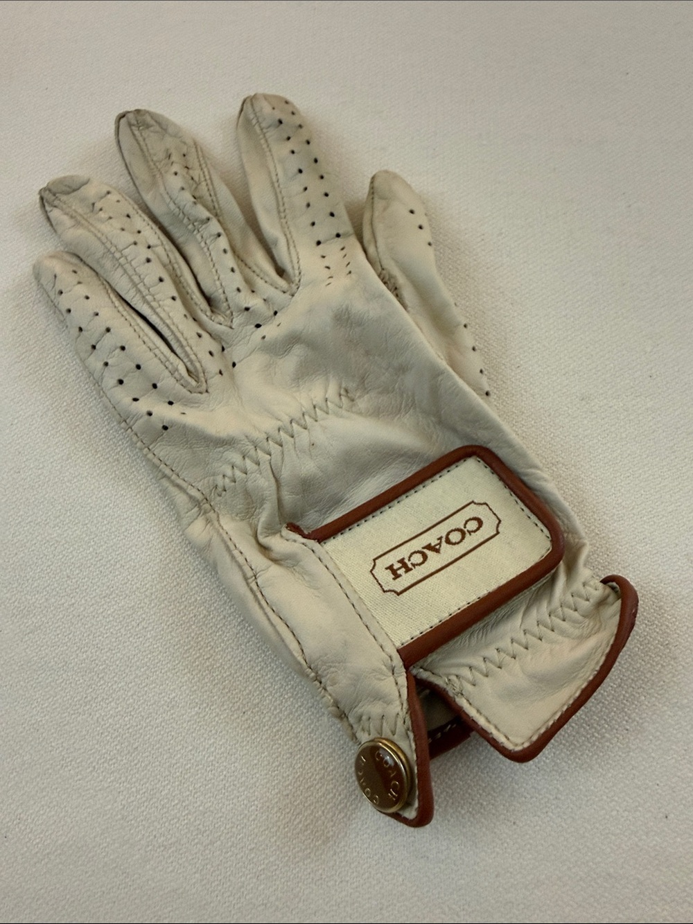 Vintage Coach ladies White Leather Golf Glove with Brown Trim and Logo Patch